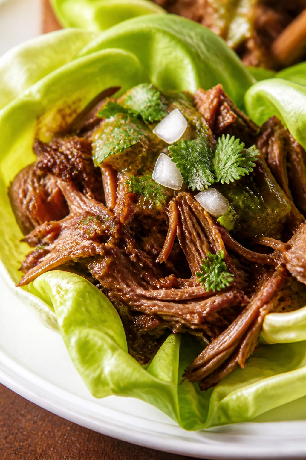 Lettuce cup filled with barbacoa