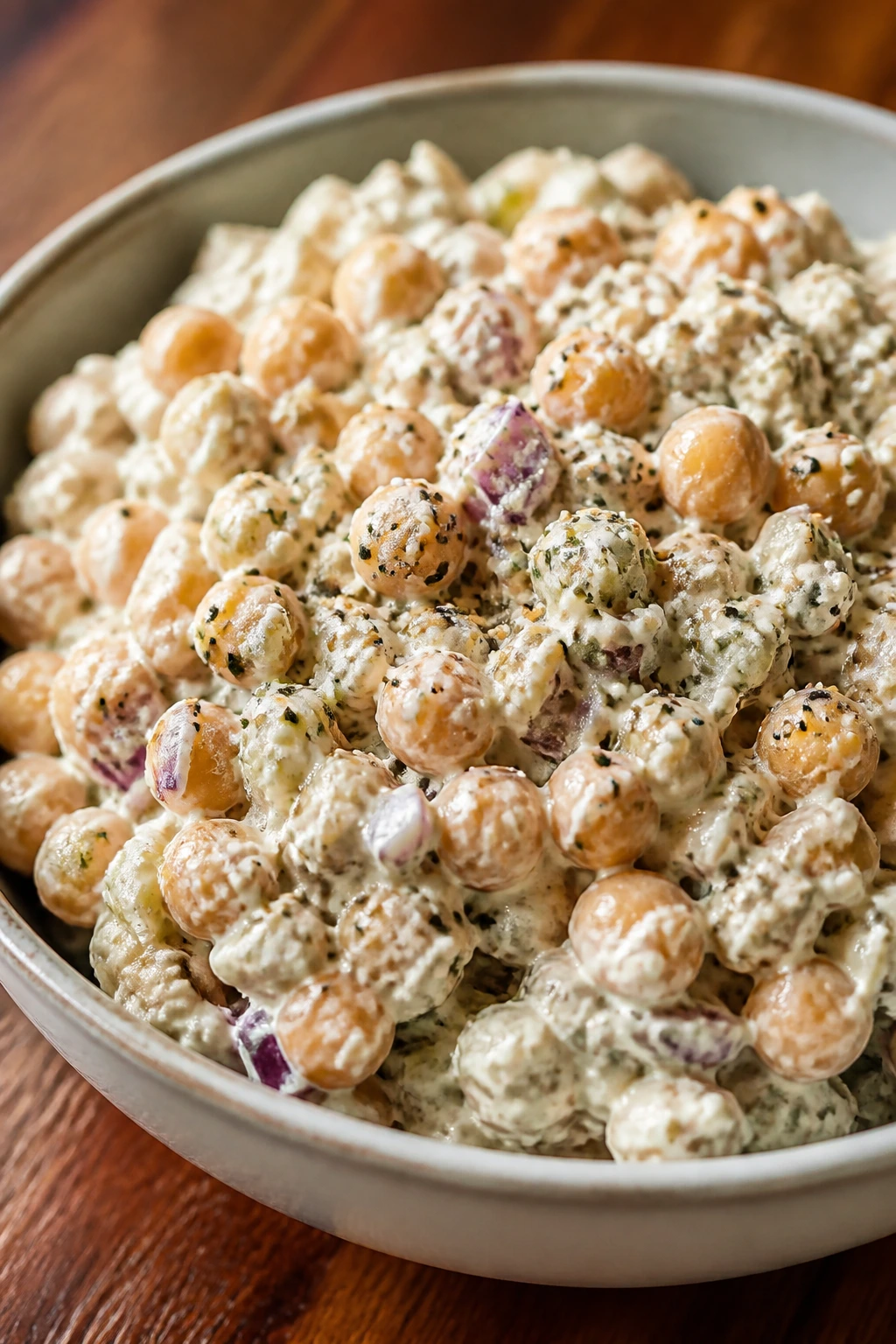 Creamy chickpea salad with everything bagel seasoning in a bowl