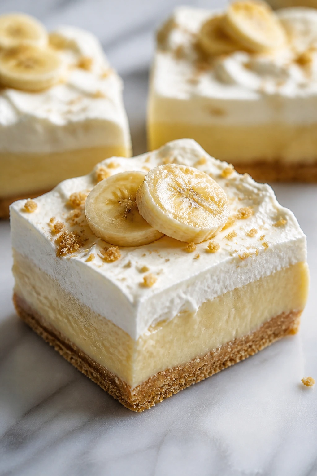 Close-up of Banana Pudding Bars showing banana cream and wafer crust layers