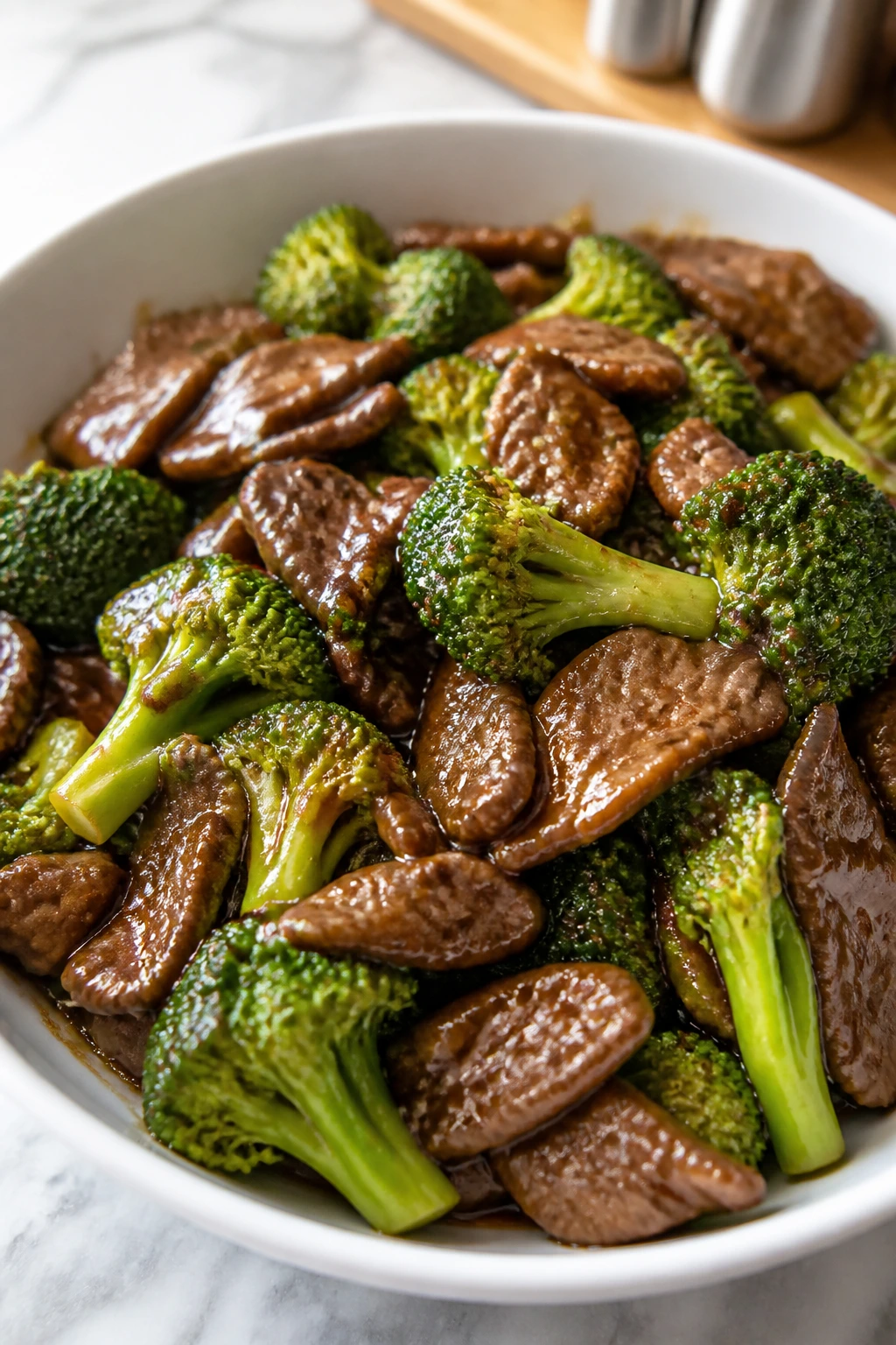 Beef and broccoli close-up in a bowl
