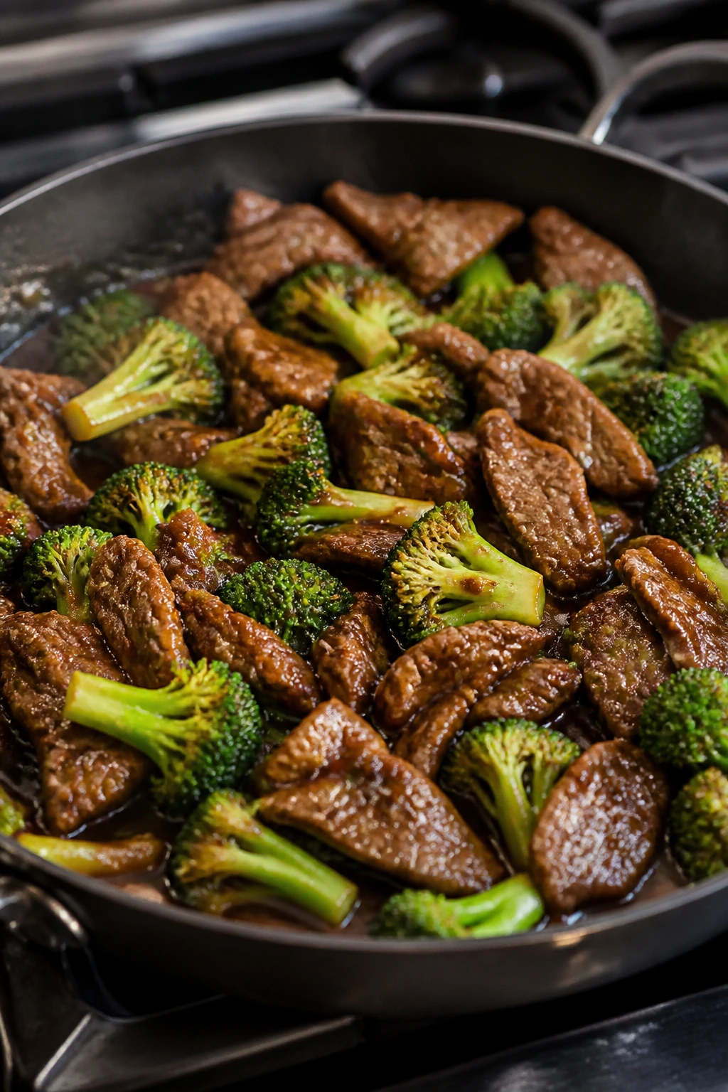 Beef and broccoli skillet close-up in pan