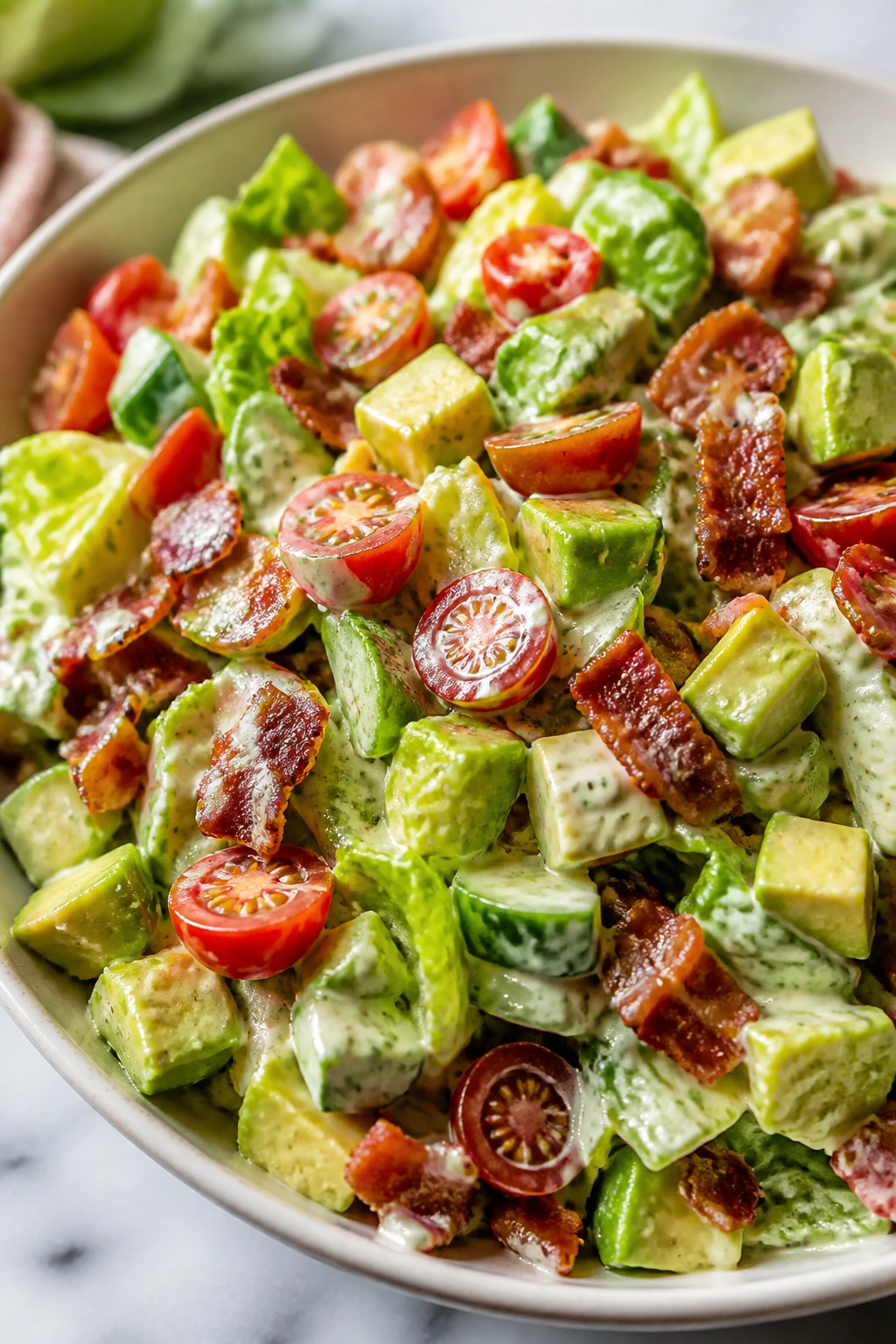 Close-up of BLT Chopped Salad with Creamy Ranch with bacon and avocado