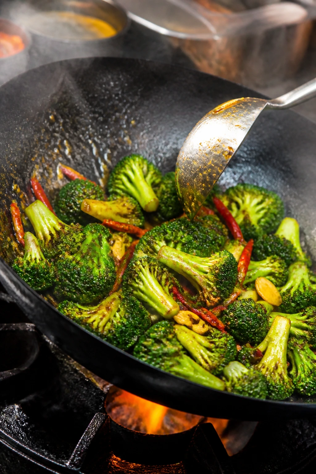 High-heat stir-fry action with blistered broccoli in a wok