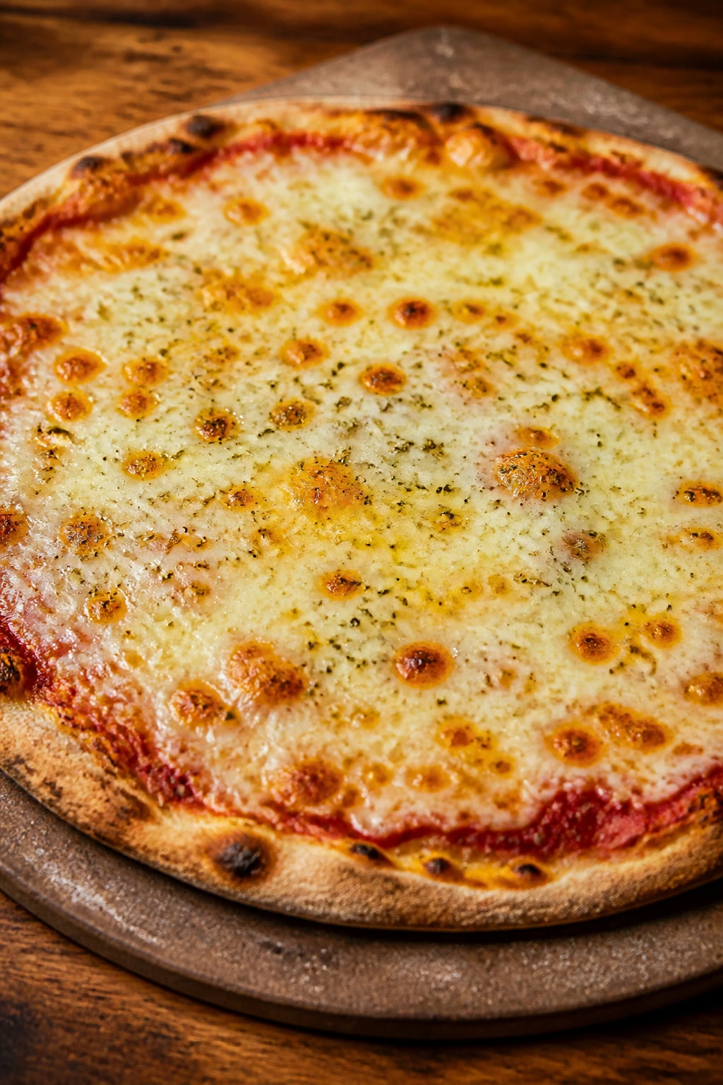 Four-cheese oregano pizza with melted cheeses