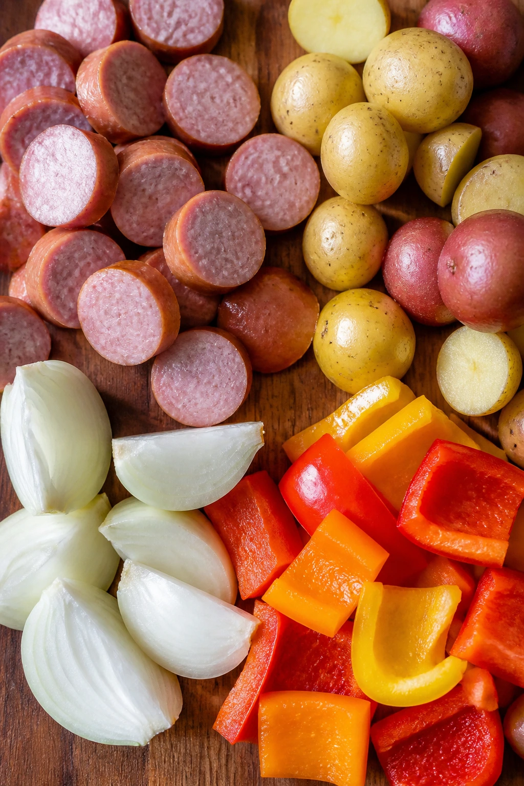 Top-down view of ingredients arranged on a wooden board