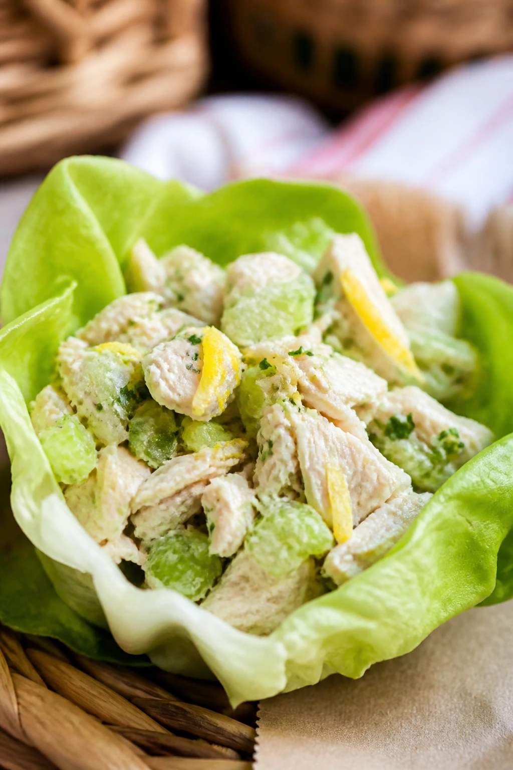 Butter lettuce cup filled with lemon chicken salad.