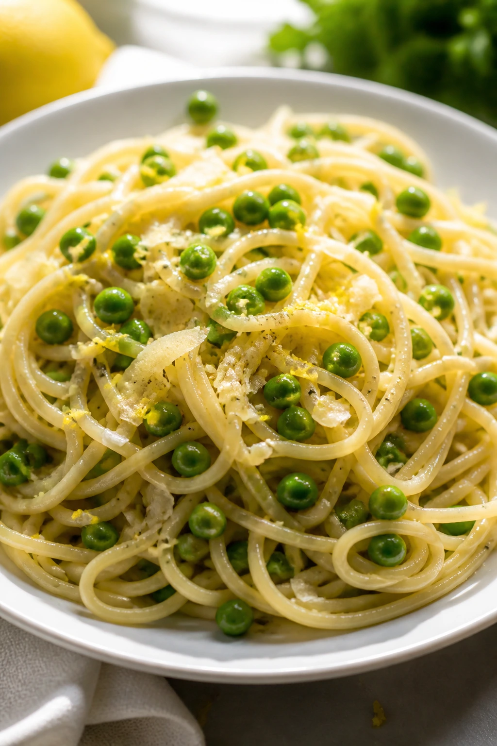 Lemon garlic peas pasta on bright plate