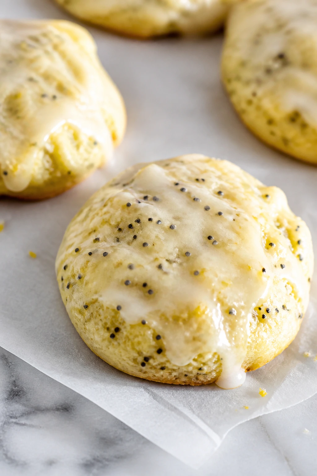 Lemon poppy seed glaze cookie with shiny glaze