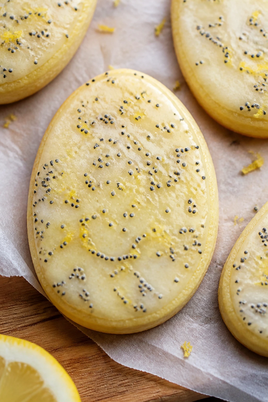 Close-up of lemon poppyseed Easter Egg cookie with glaze