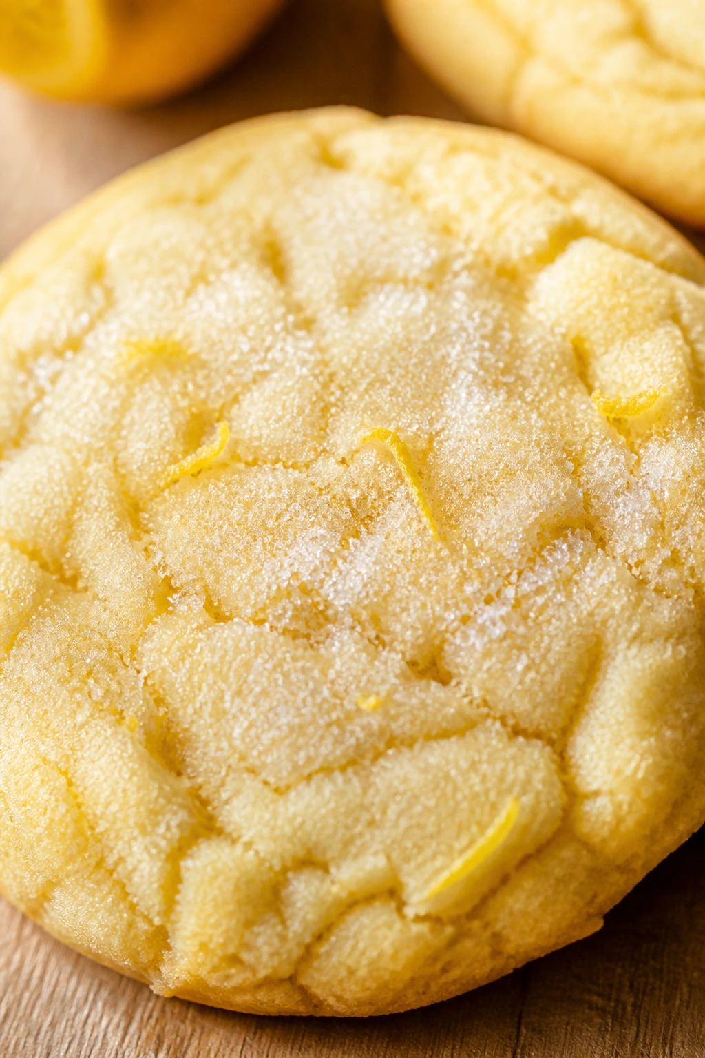 Close-up of a lemon-zested sugar cookie with sugar crystals