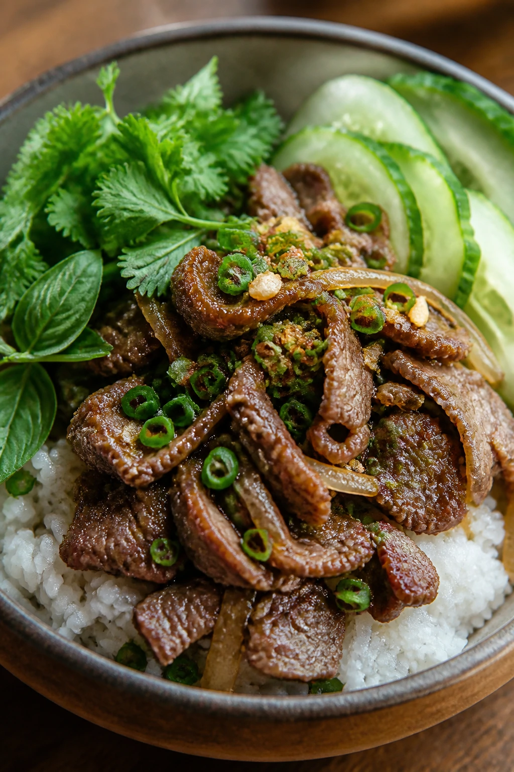 Beef lemongrass bowls with rice and cucumber