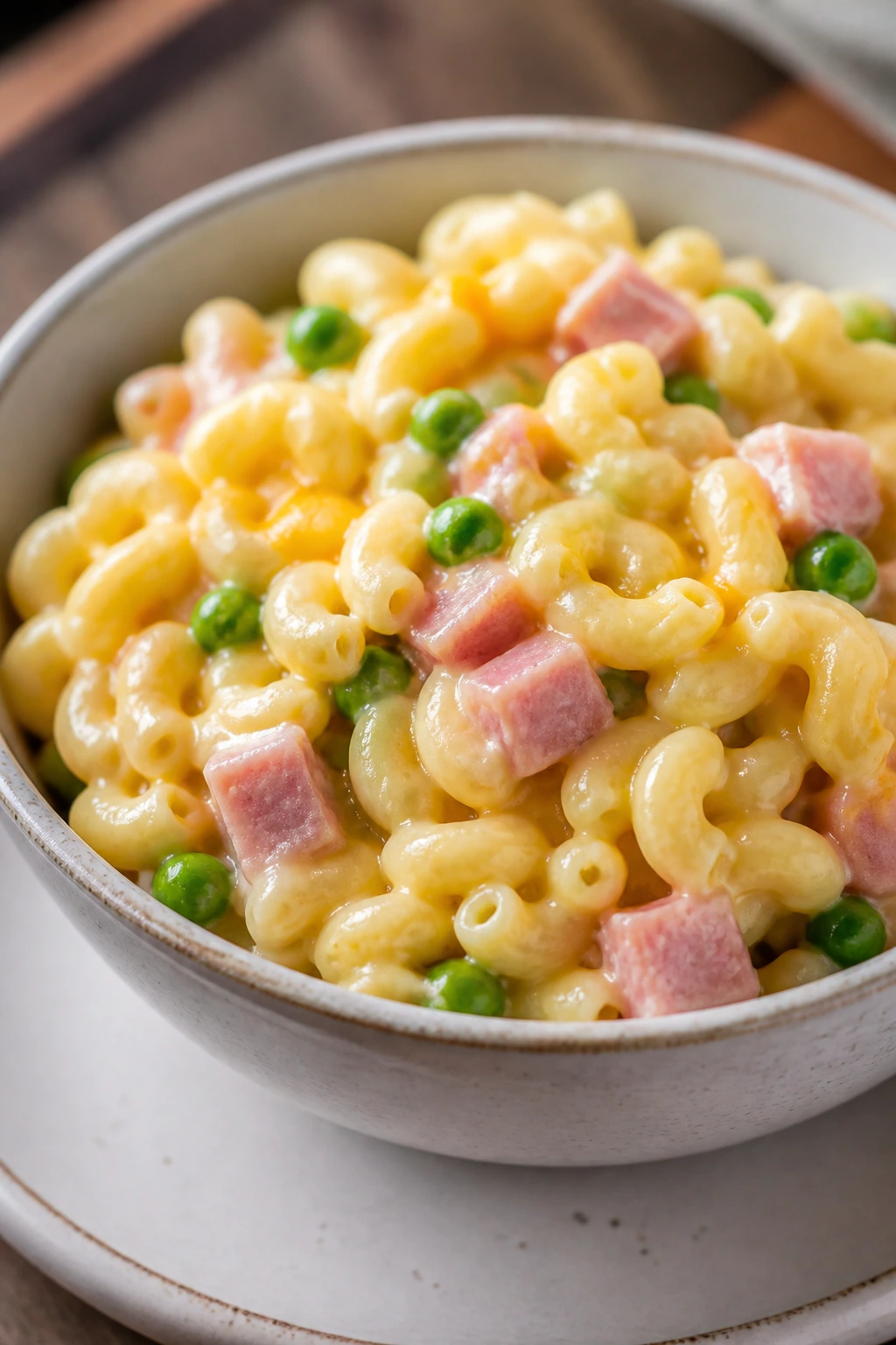 Close-up of ham and pea macaroni in creamy sauce