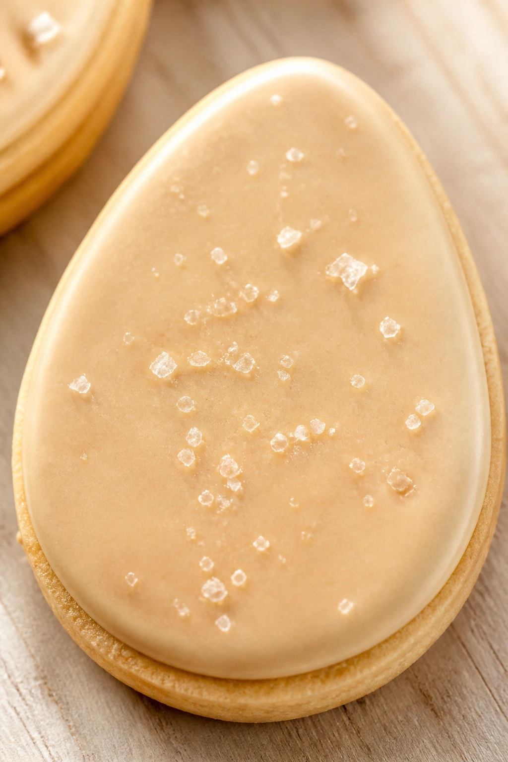 Close-up of Maple Sugar Cookie with maple glaze and flaky salt