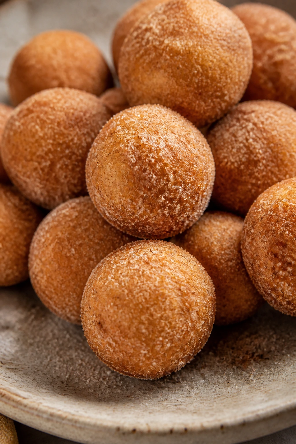 Close-up of cinnamon-sugar mini donut holes