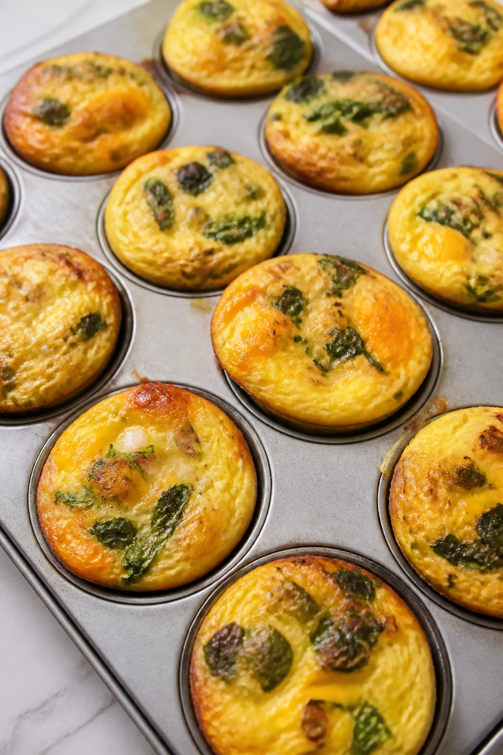 Close-up of mini frittata muffins in a muffin tin