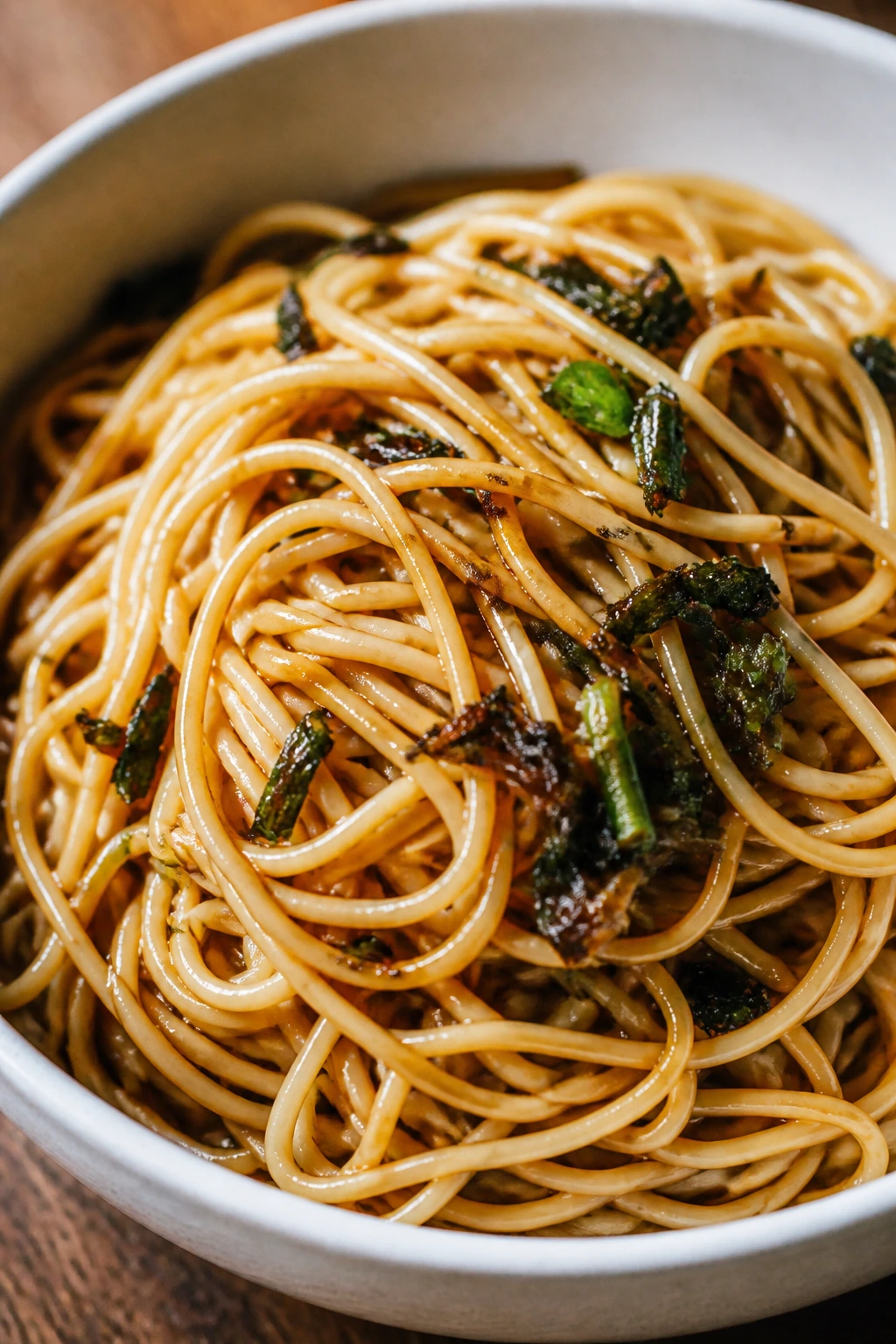 Close-up of scallion oil noodles in a bowl