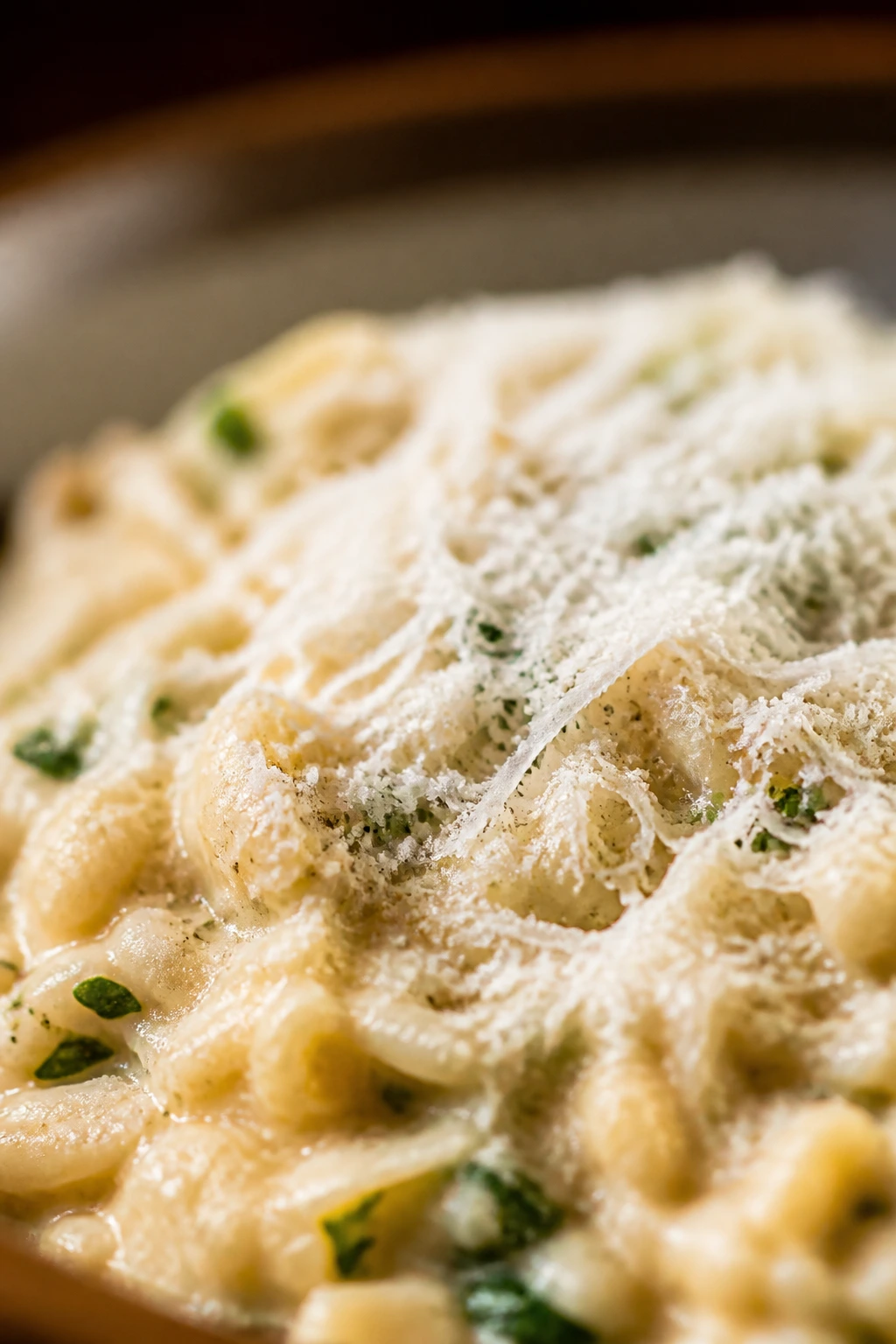 Freshly grated parmesan dusting on a dish