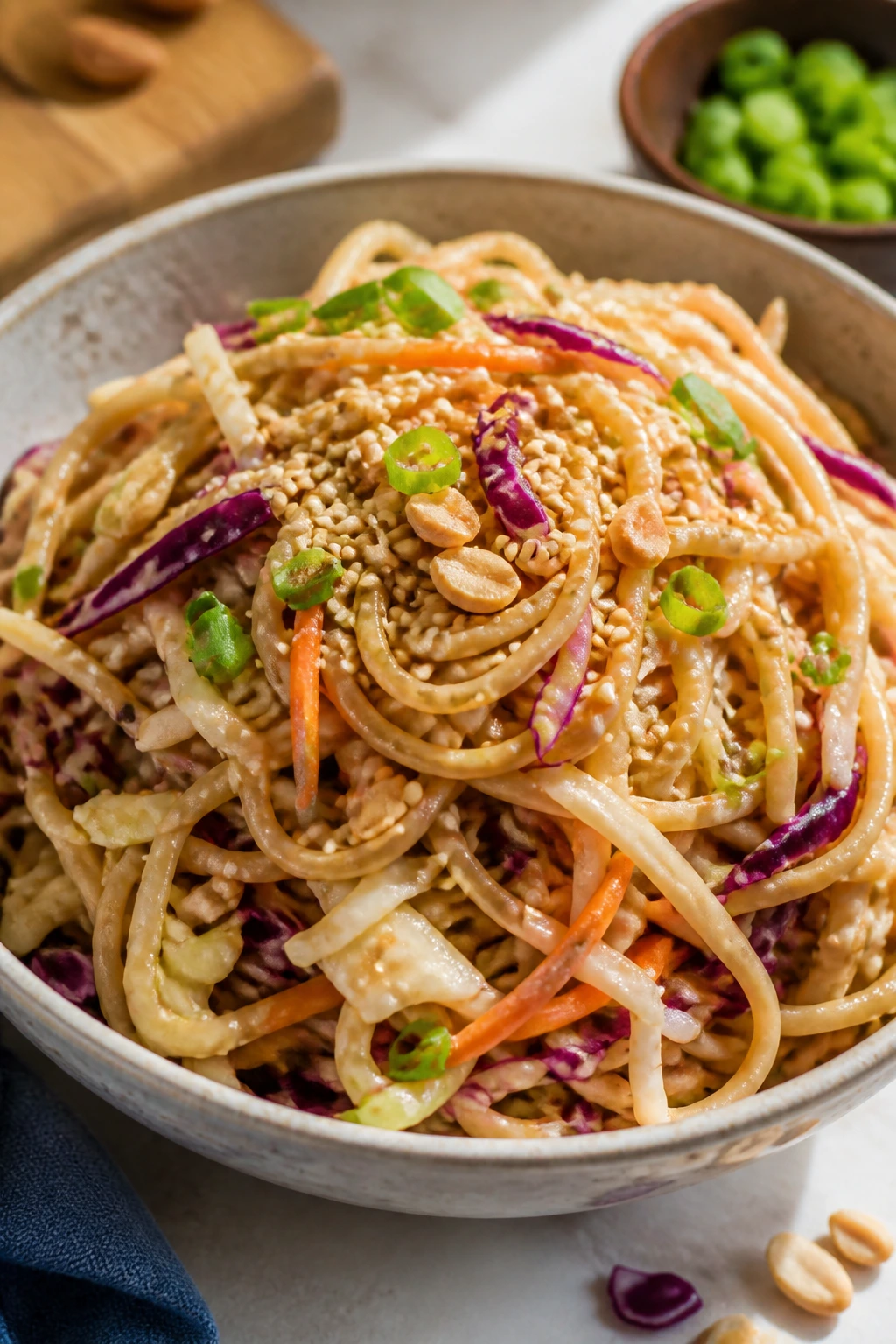 Close-up of peanut noodle salad with cabbage in a bowl