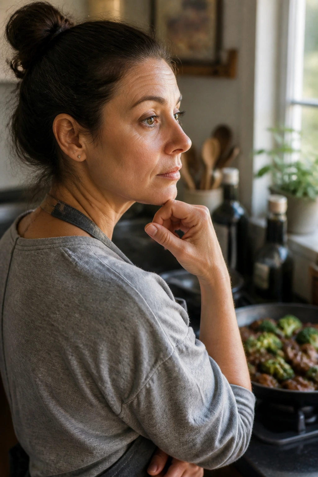 Thoughtful home cook considering beef and broccoli prep