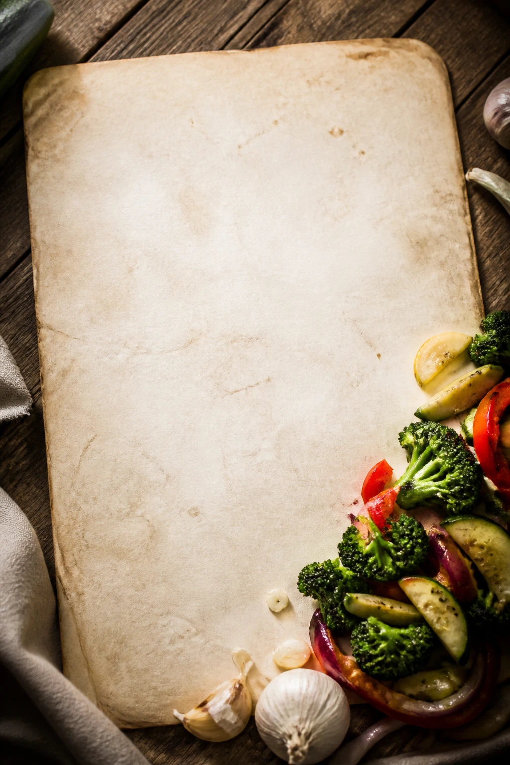 Blank recipe card dominates frame with garlicky vegetables cueing the recipe