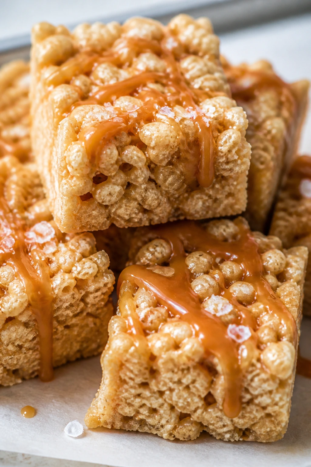 Rice Krispie treats with caramel drizzle and flaky salt