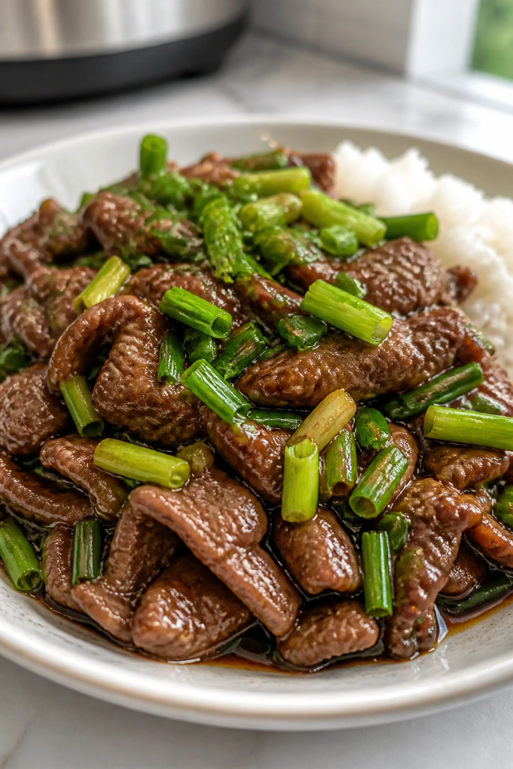 Beef with scallions in glossy sauce