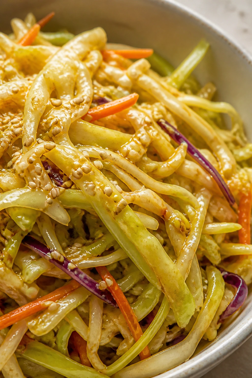 Cabbage leaves coated with glossy sesame-ginger dressing