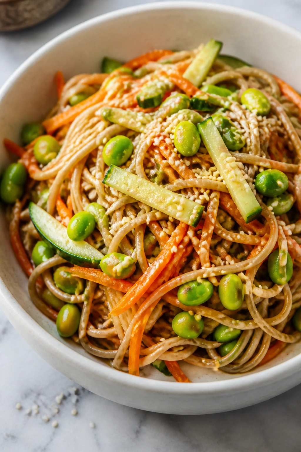 Sesame noodle salad with vegetables and sesame seeds