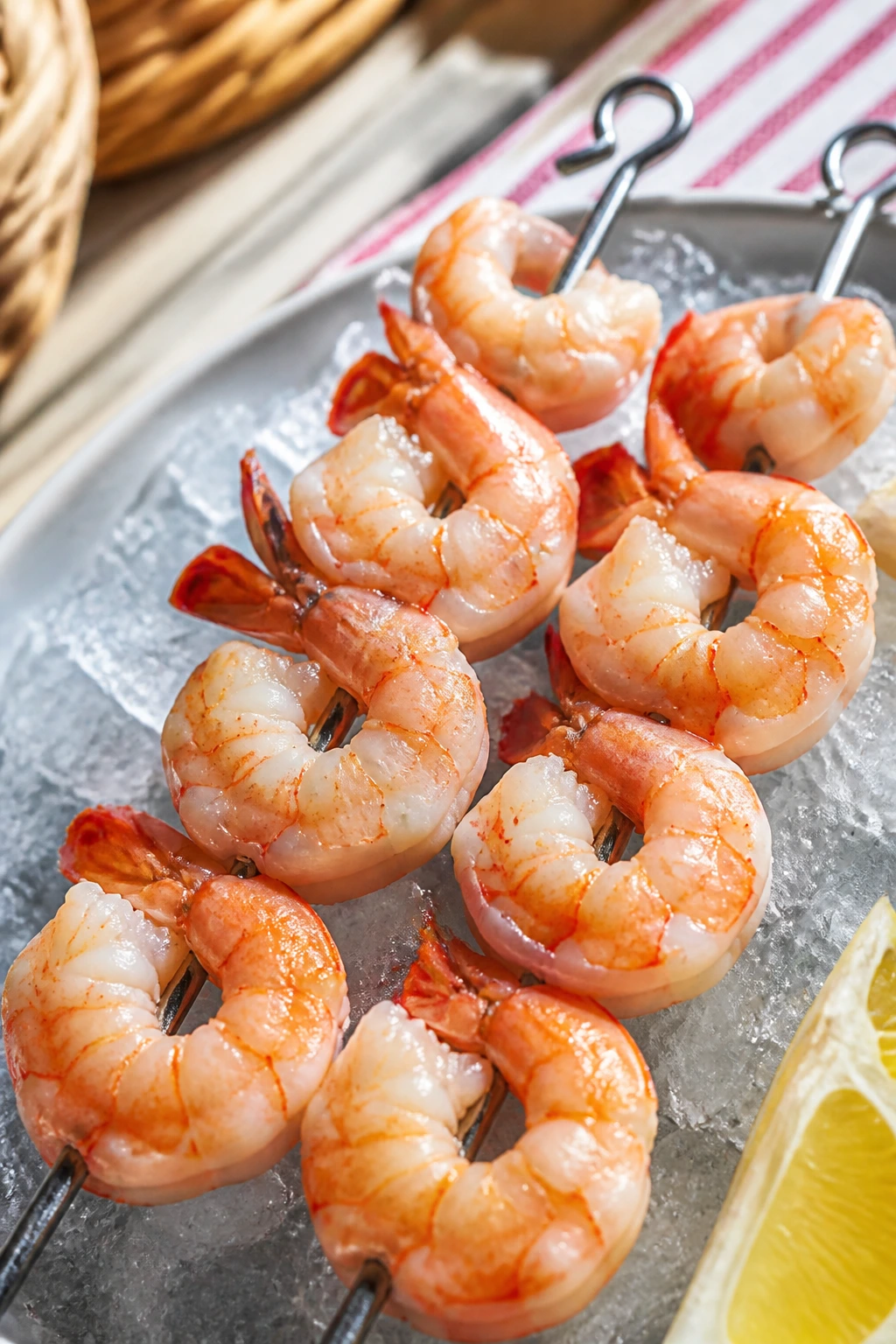 Close-up of shrimp cocktail skewers on ice