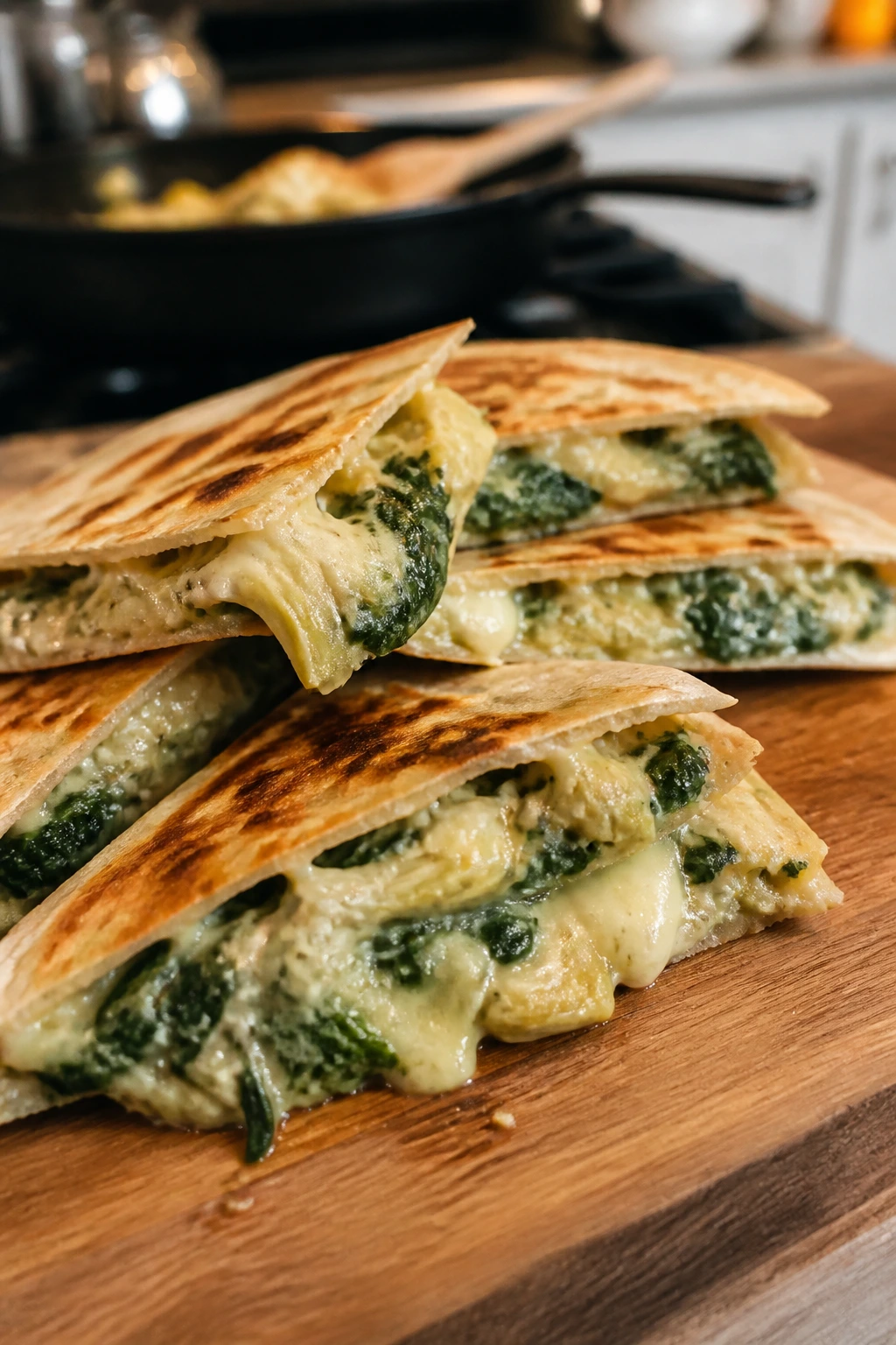 Close-up of spinach-artichoke quesadillas with melted cheese