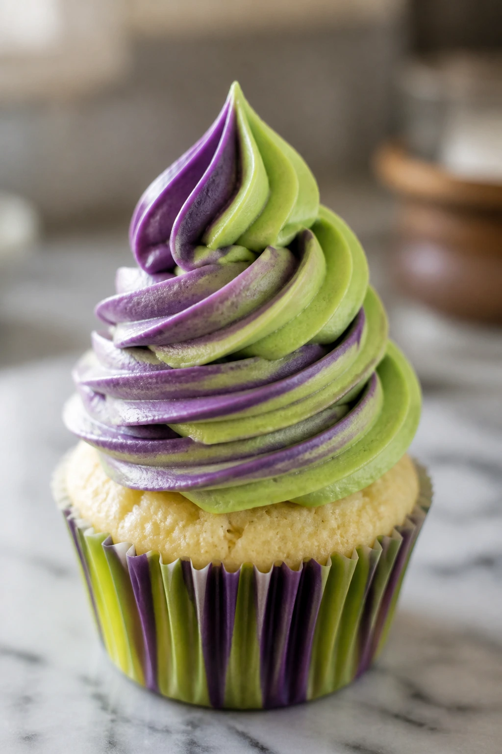 Tall, smooth marbled frosting swirl on a cupcake