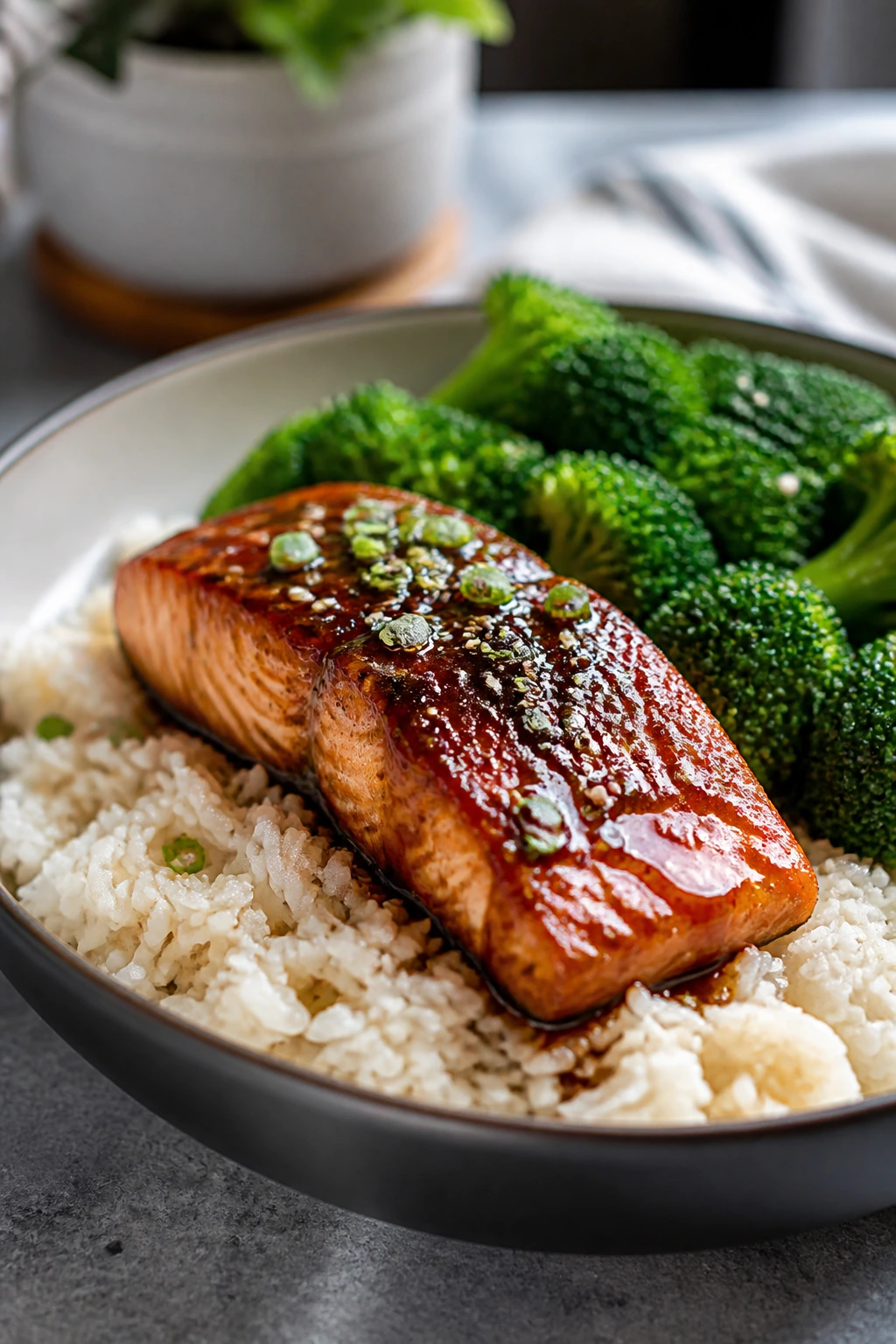 Teriyaki salmon bowl with rice and broccoli