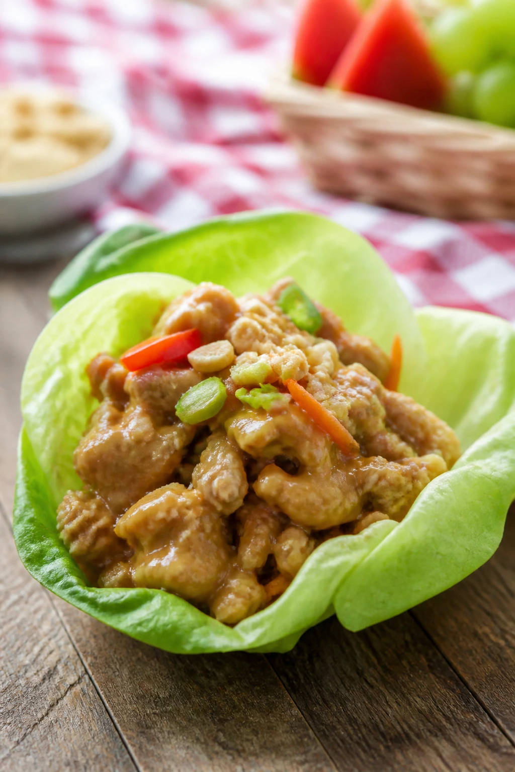 Close-up of Thai peanut chicken lettuce cup