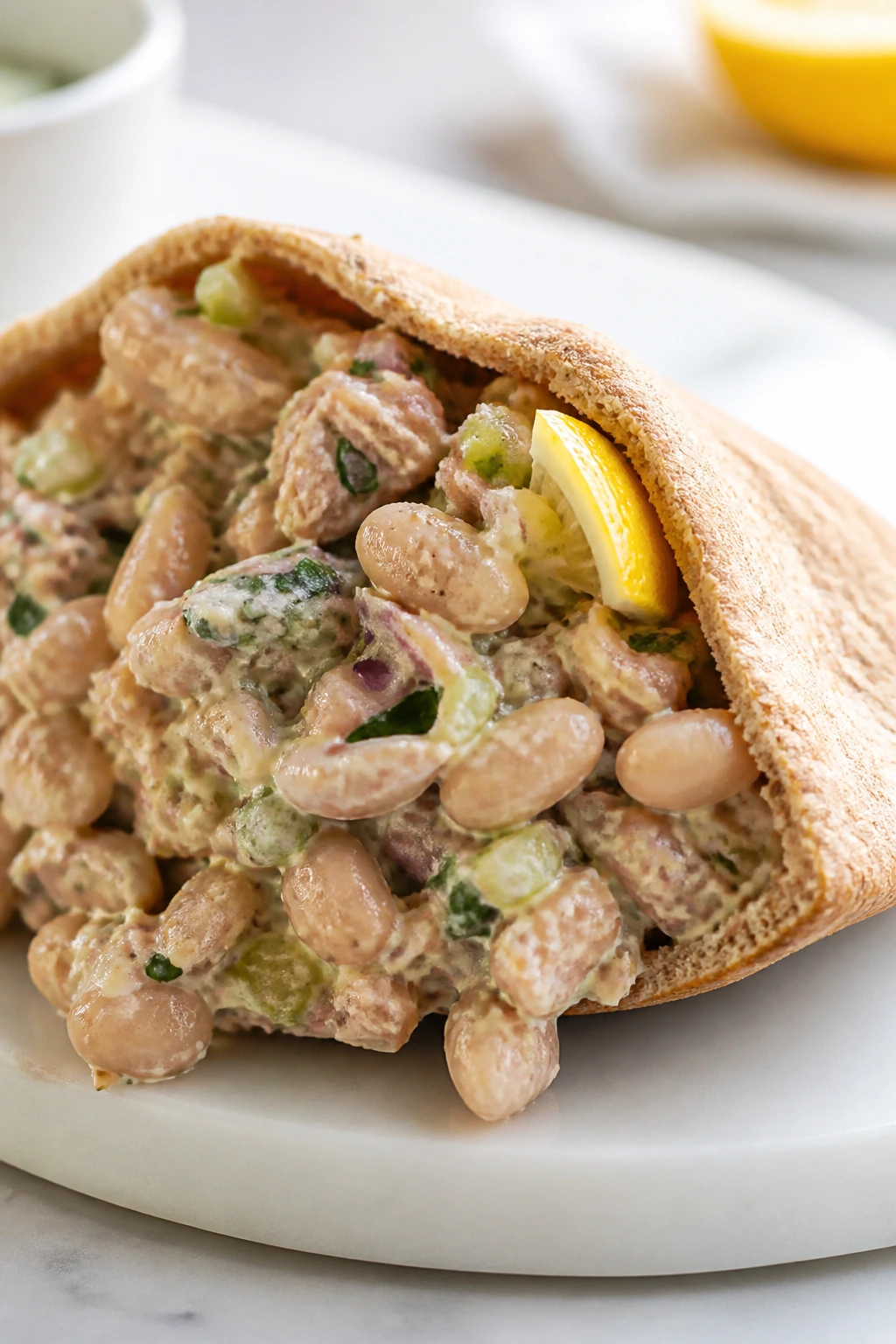 Pita stuffed with tuna and white bean salad